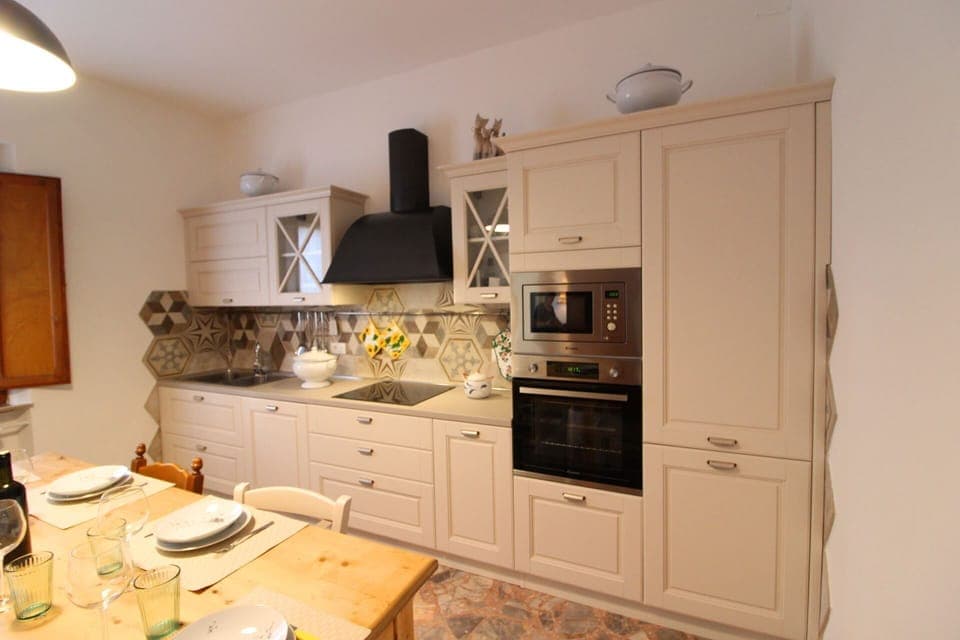 Cabinetry, Countertop, Drawer, Kitchen Stove, Kitchen, Wood, Kitchen Appliance, Floor, Flooring, Wood Stain