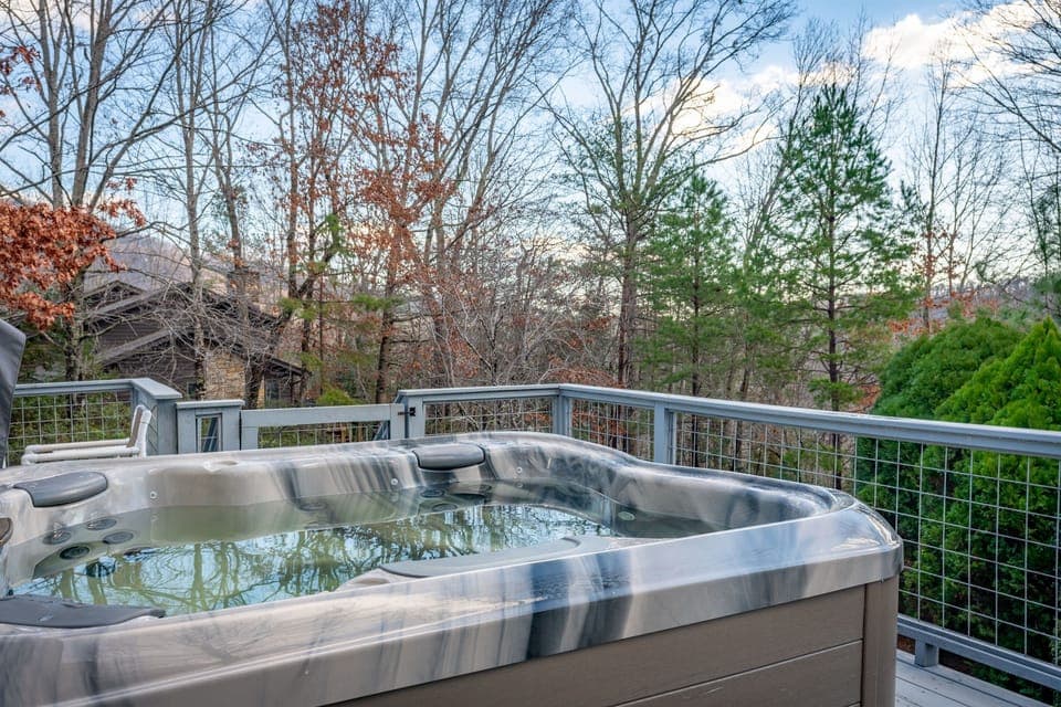 Enjoy the hot tub overlooking beautiful nature