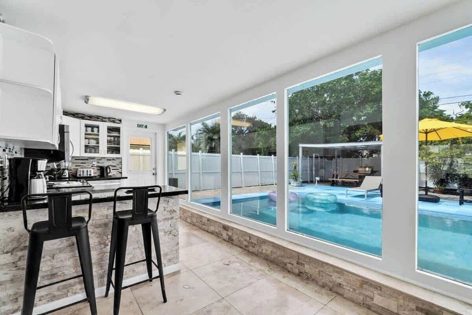 Welcome to your tropical retreat! This charming home with lush landscaping is perfect for laid-back getaways and sunny stays.