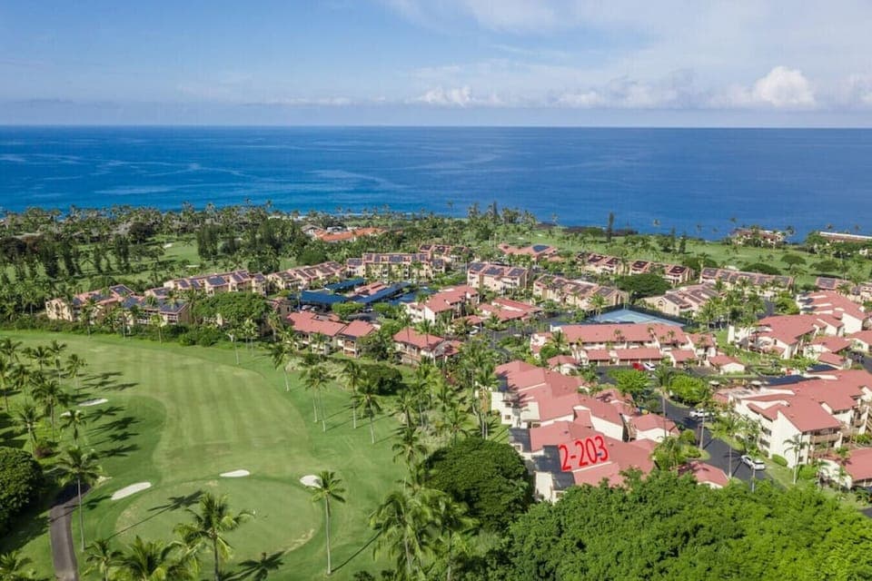 Bird`s-eye-view of the complex and the surrounding golf course.