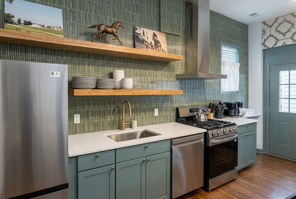 Pick up a fresh plate from the beautiful wooden open shelves to serve up your favorite snacks. Our eco friendly kitchen is completely stocked and features a massive stainless steel fridge for all your groceries.