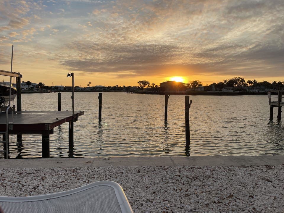 Welcome to Sunburst Vacation Rentals!  Wake up to this waterfront sunrise on your backyard...or better yet, stay in bed in the king bed in the master bedroom that overlooks this view!