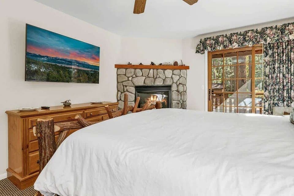 Relax in bed warmed by the fire and enjoying your favorite shows