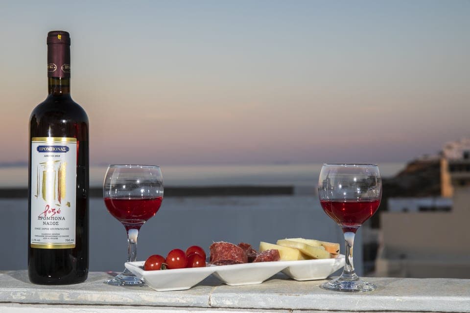 Local delicacies taste even better when enjoying the view of the sea and sunset.