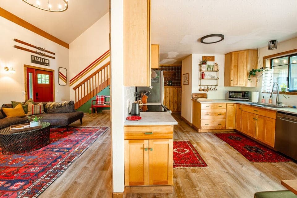 View of the flow of the living room and kitchen. You never need to be too far from the action.