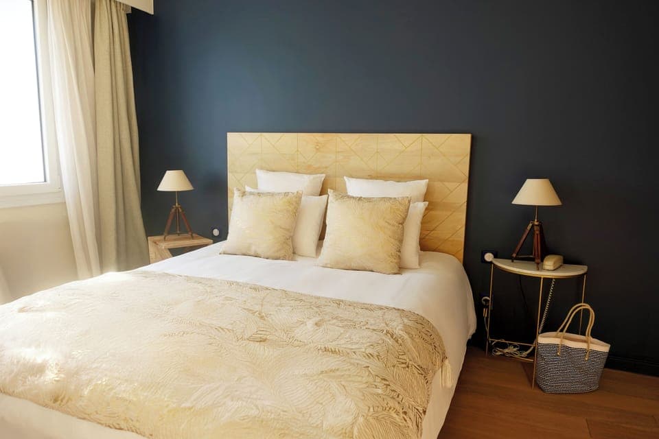 Family Quadruple Room | Pillowtop beds, individually furnished, blackout drapes