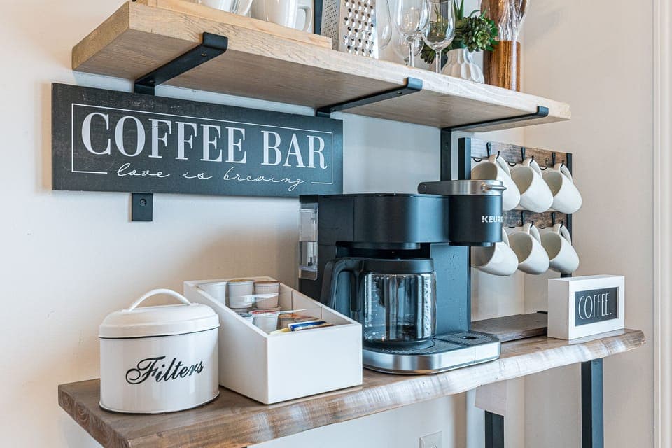 Fully stocked coffee bar with Keurig combo coffee maker.