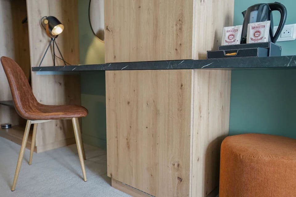 Laptop workspace, blackout drapes, iron/ironing board