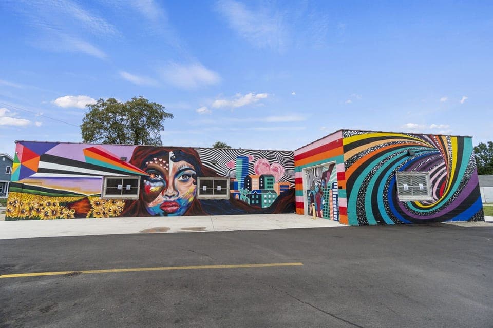 Mural we commissioned on the east side of the building.