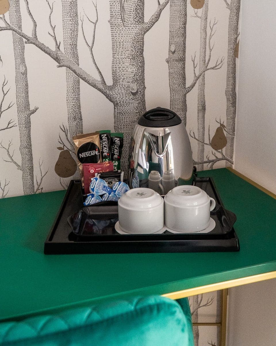 Minibar, desk, laptop workspace, cribs/infant beds