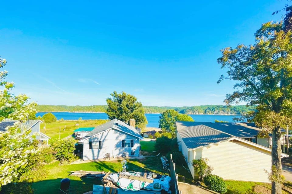 Wake to expansive lake horizons. Dual homes offer boundless tranquility.