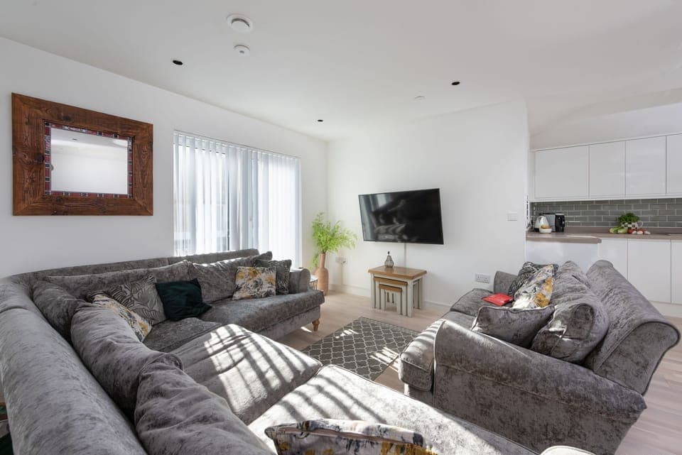 Sofa seating and Smart TV with free wi-fi in living area - Artemis House