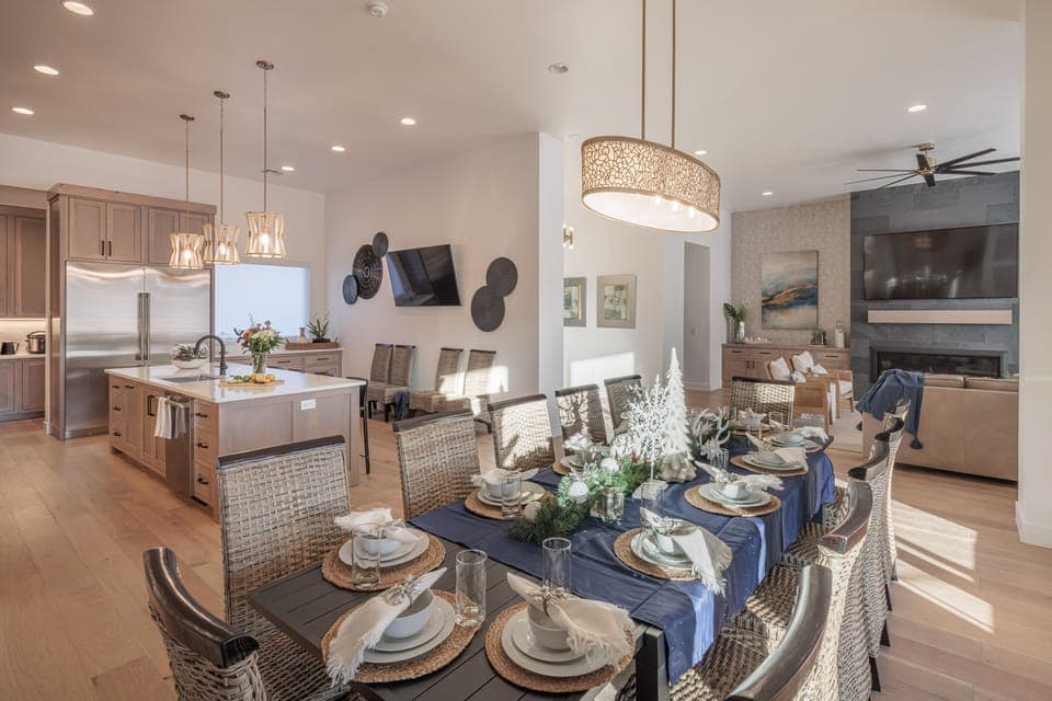 Dining Table, Kitchen, and Living Room - With an open and spacious floor plan, the dining room and kitchen can accommodate groups large or small for cooking, meals, and mingling.