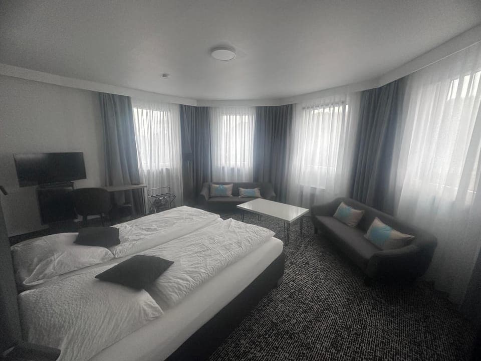 Family Triple Room, Multiple Beds, River View | In-room safe, desk, laptop workspace, free WiFi