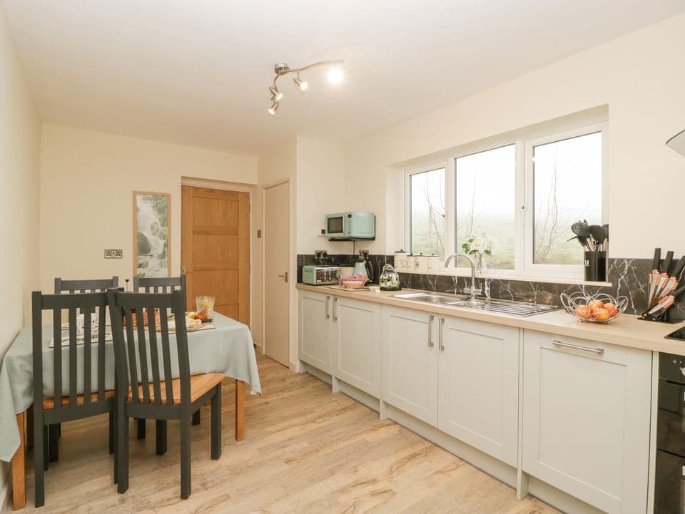 Fridge, dishwasher, electric kettle, cookware/dishes/utensils