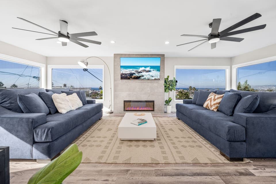 Spacious living room area with with big comfortable couches and great views!