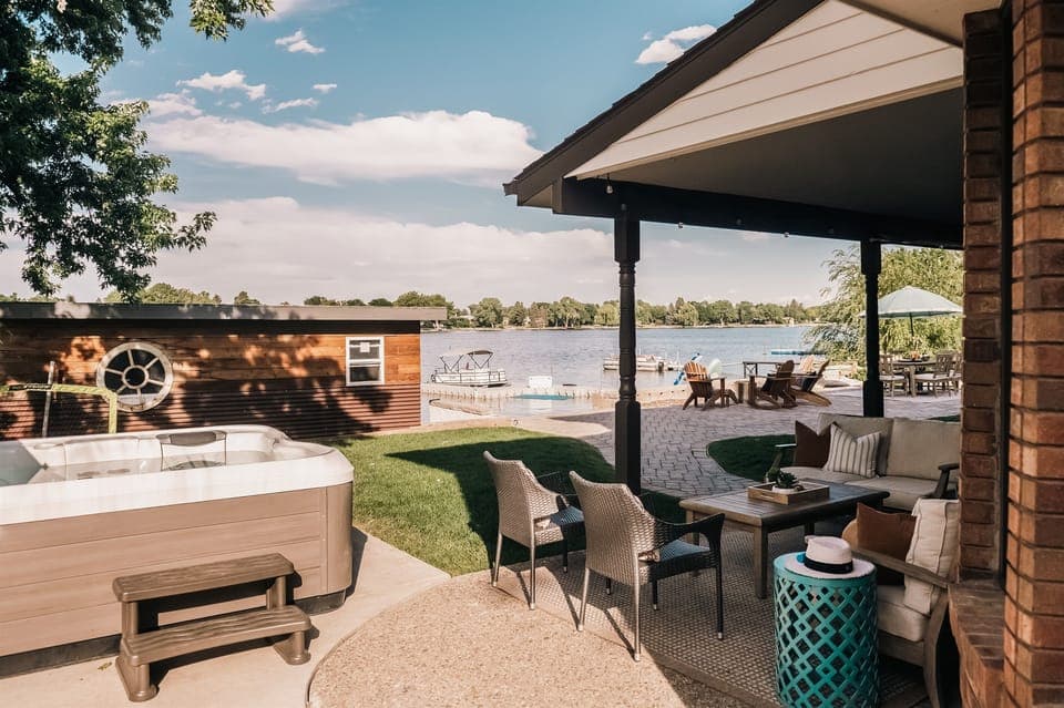 Unwind in the hot tub with sweeping lake views.