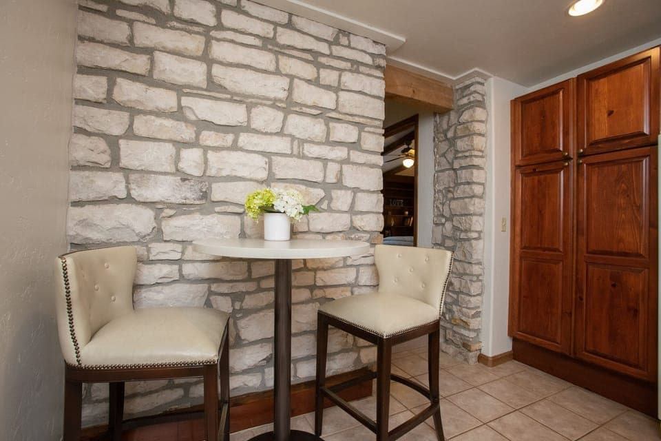  High top seating, four bar stools.