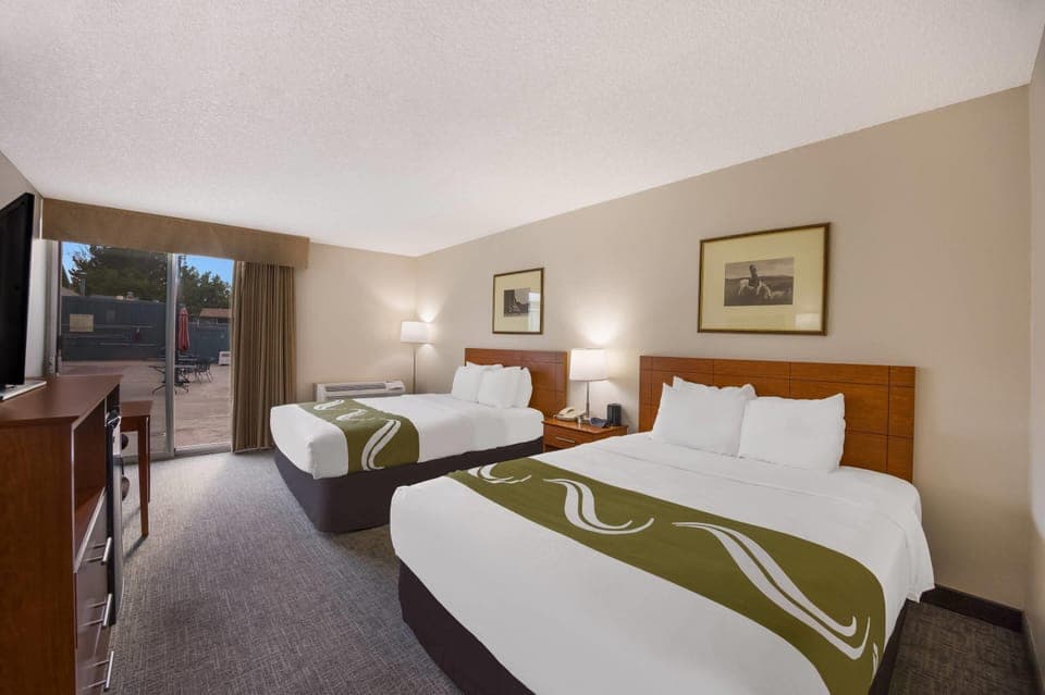 Room, 2 Queen Beds, Non Smoking, Poolside | Individually decorated, individually furnished, desk, laptop workspace