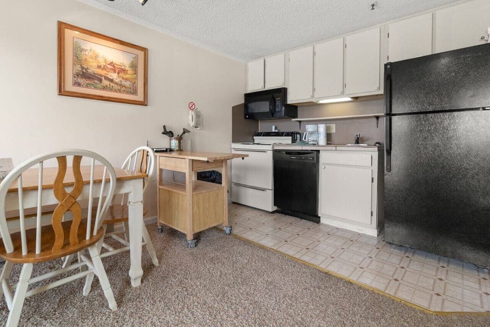 kitchen is fully-equipped  with pots, pans & utensils.