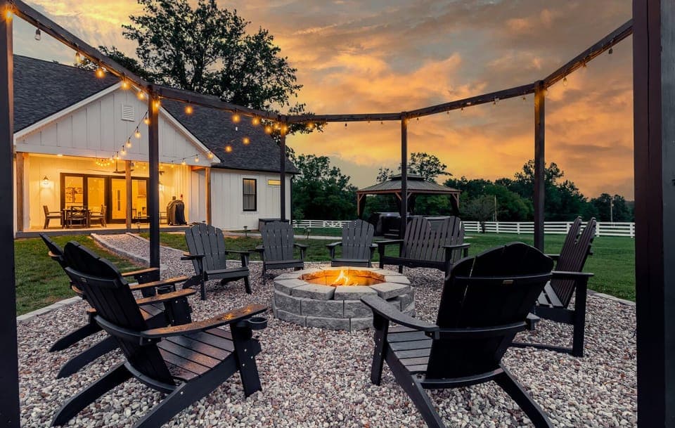 Gather around the fire pit in this cozy countryside retreat. With seating for 12, it’s the perfect spot to unwind, enjoy the night skies, and make memories under the stars.
