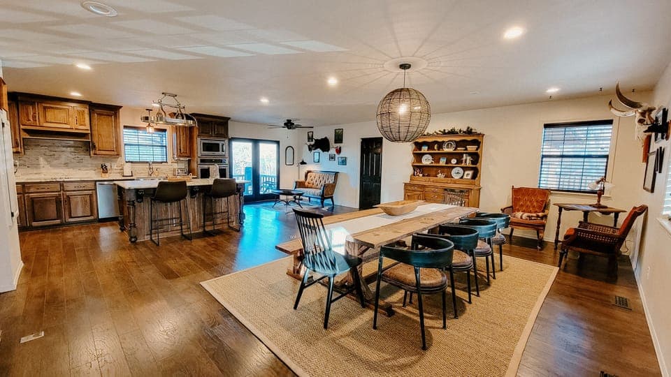 Custom table to seat 10 with bar for 3! Dining area with outdoor decks! 