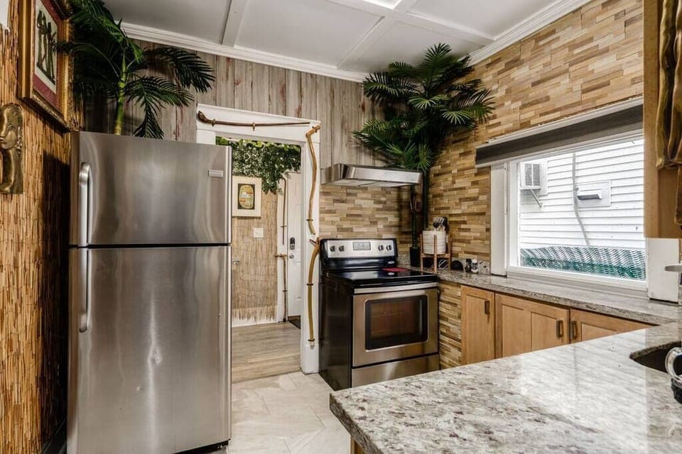 Granite countertops. High end cabinetry with all dining/cooking essentials.