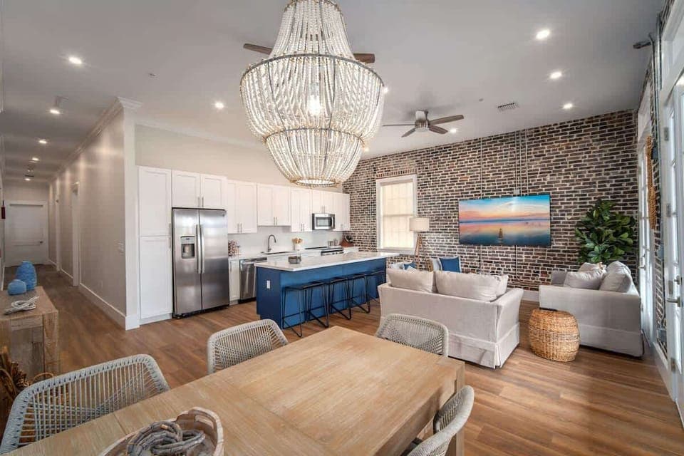 Living room has 1 queen and 2 twin sleeper sofas 