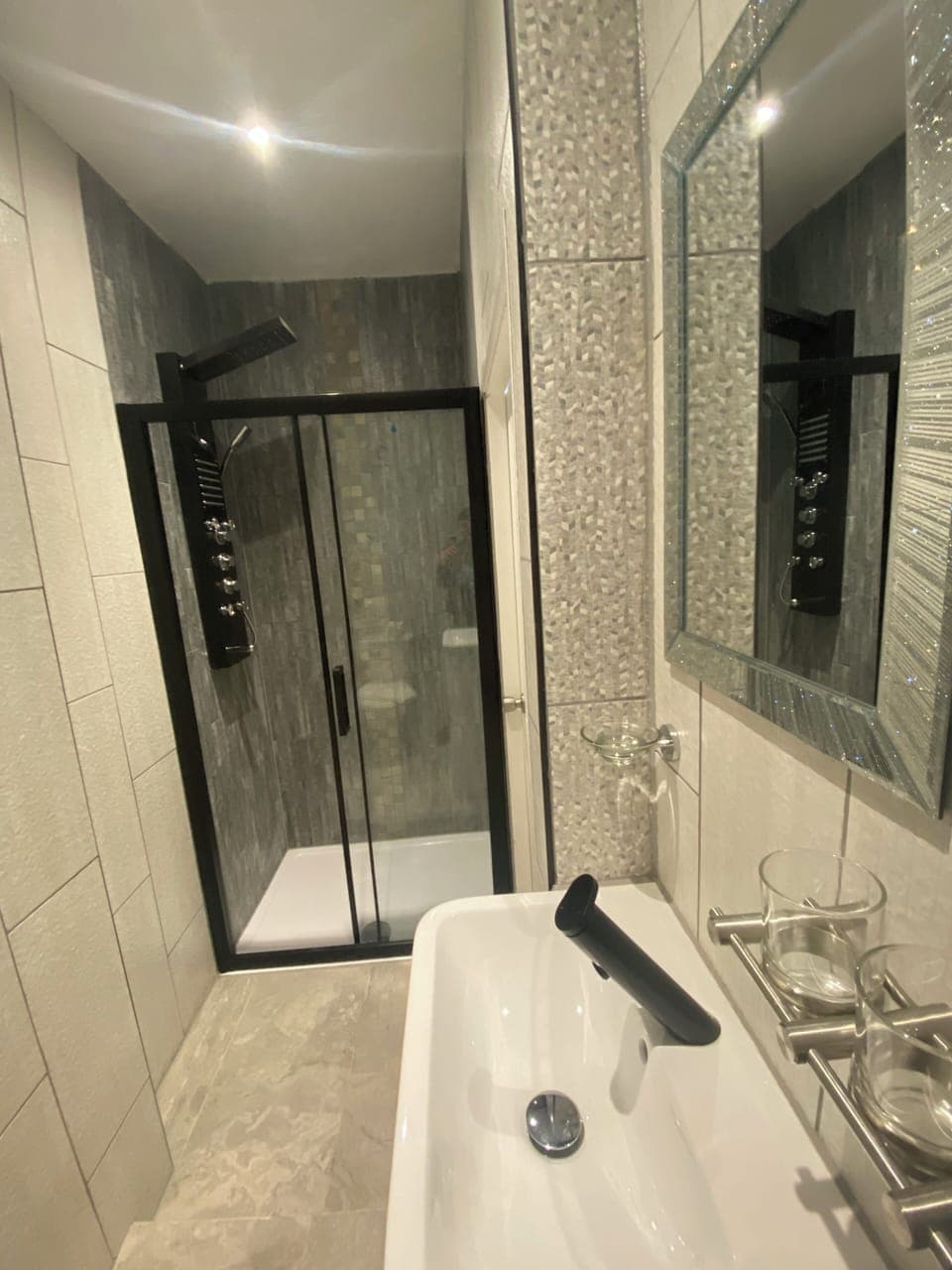 Deluxe Room, 2 Bedrooms | Bathroom | Shower, free toiletries, towels, soap