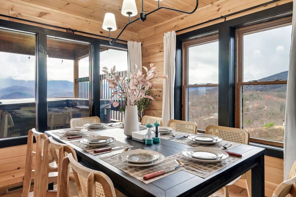 Dining table-can sit 8 people. More outdoor dining area on the deck.