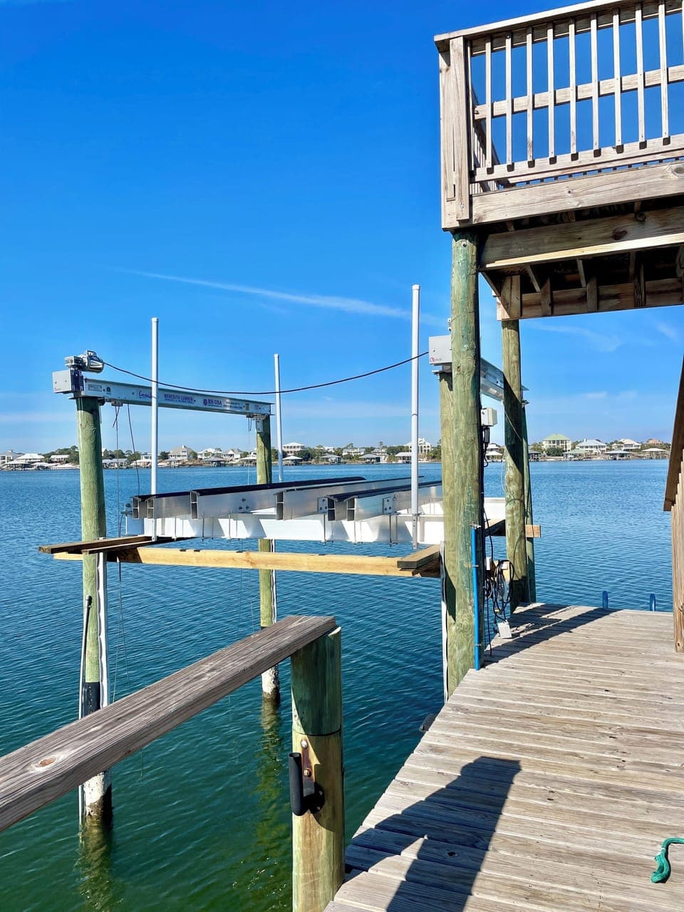 the lift capacity is 16,000 lbs and accommodates a boat 30' long and 9' wide