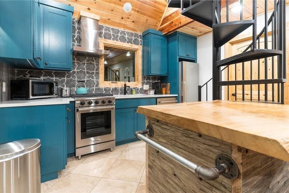 The full kitchen in the ground level house.