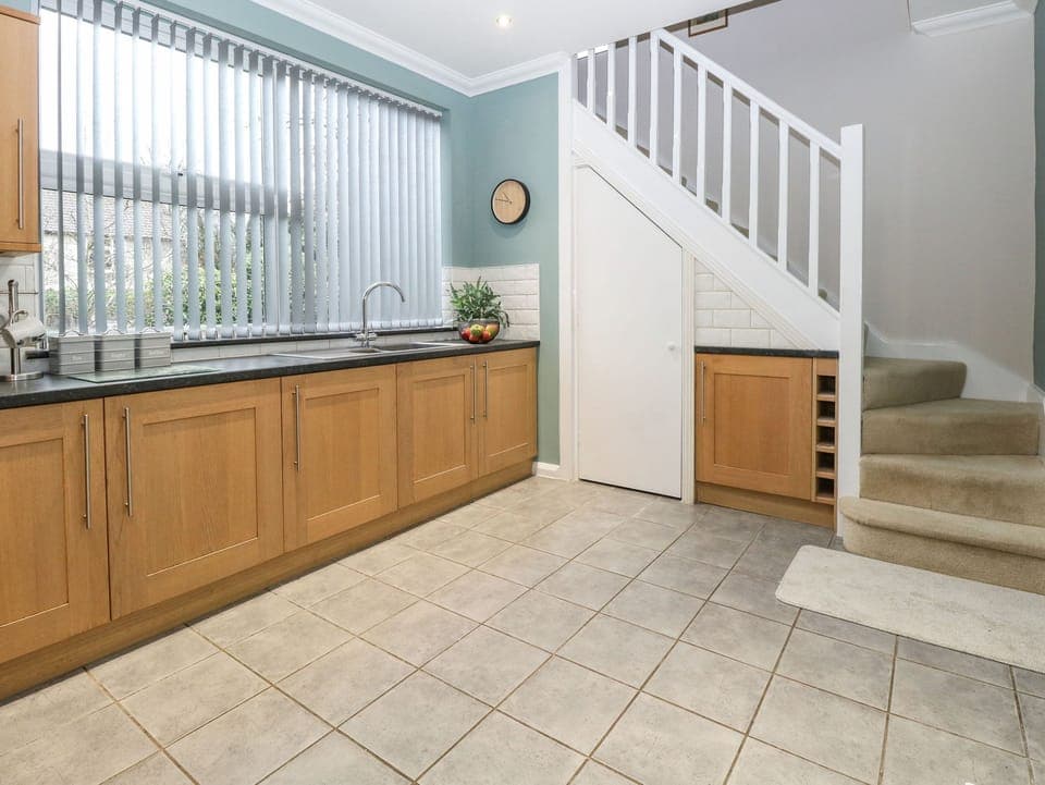 Fridge, electric kettle, cookware/dishes/utensils