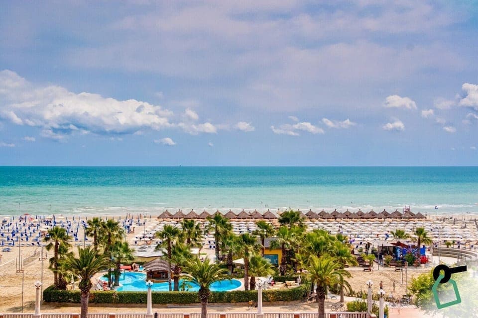 Private beach, white sand, sun loungers, beach umbrellas