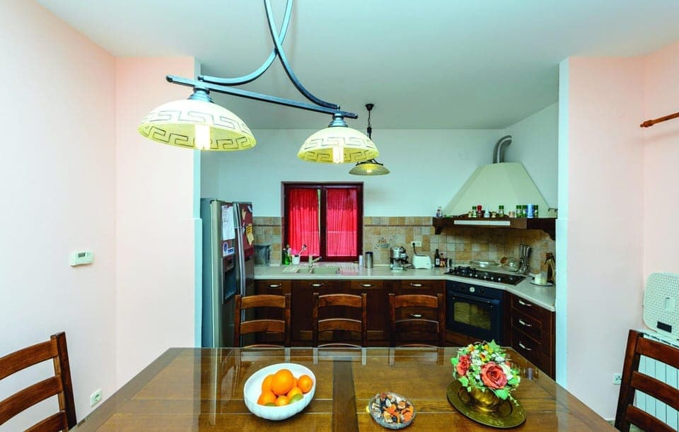 Villa | Private kitchen | Fridge, oven, stovetop, dishwasher