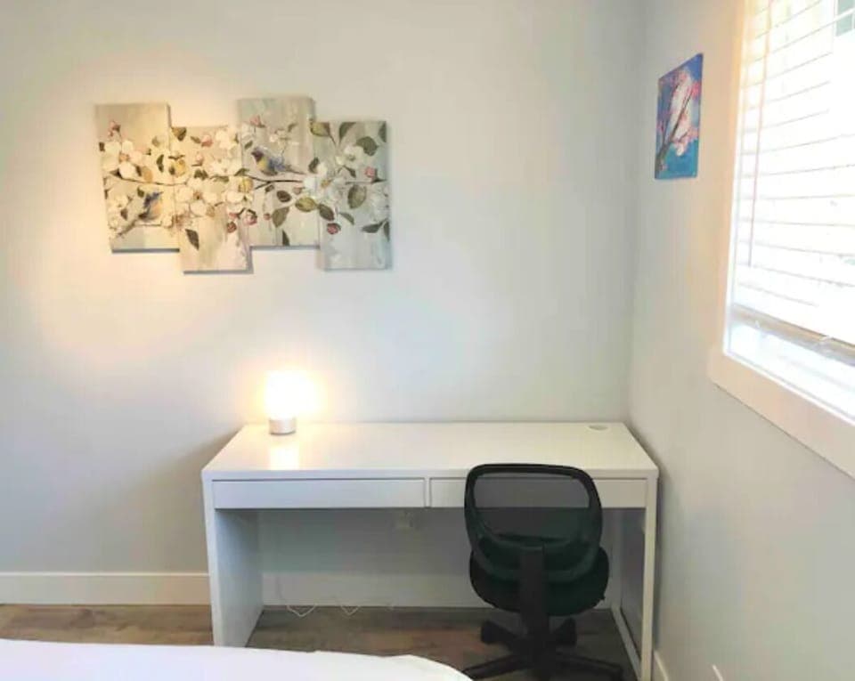 In the first bedroom, you'll find another big desk for work or study.