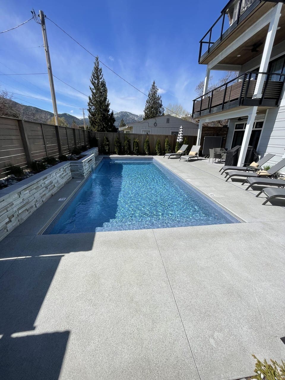 Pool/deck area with front of house, decks, patio