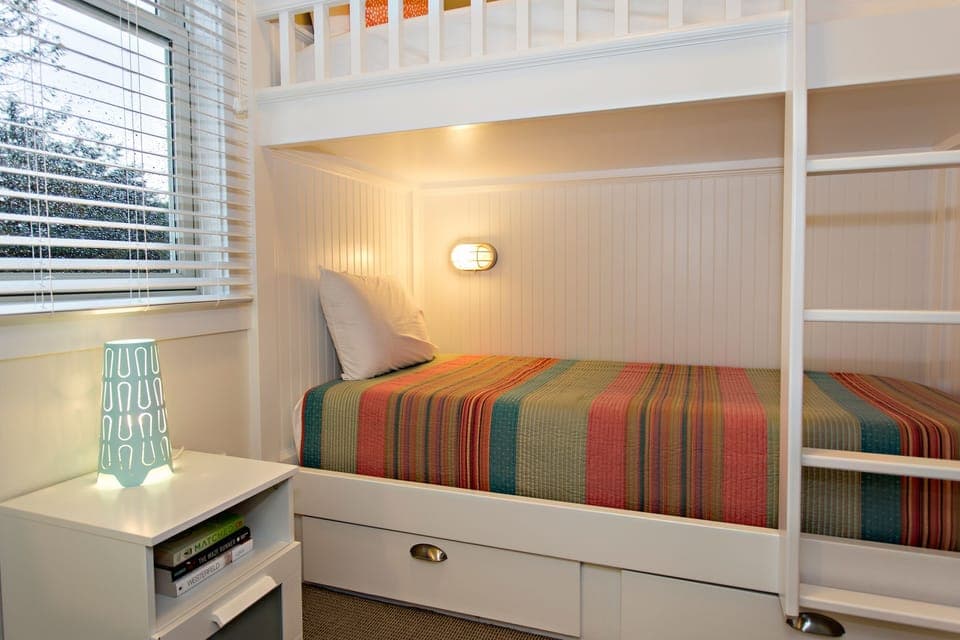 Private lighting for each bed makes reading at night easy