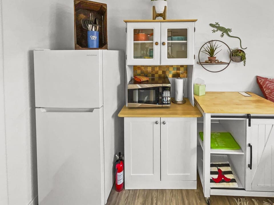 Full refrigerator and microwave and other amenities.