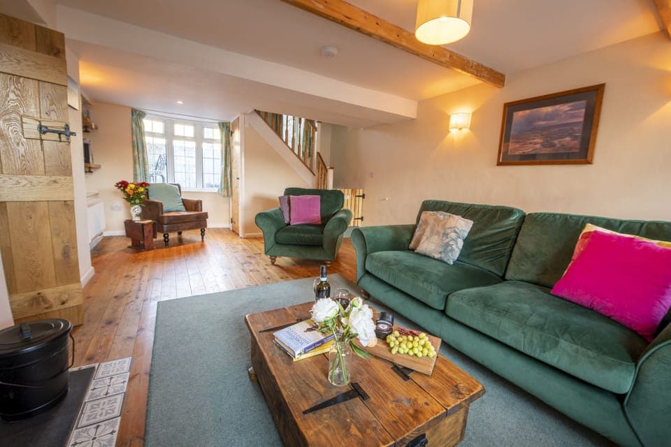 South View, Near Reeth: Dual aspect sitting room with wood burning stove