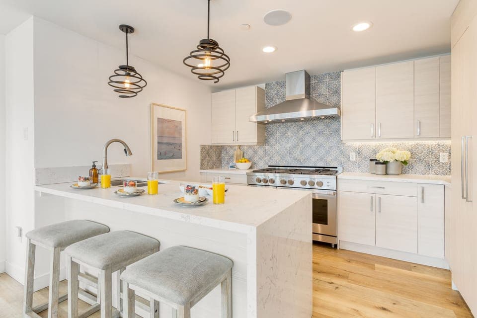 Chic kitchen with barstool seating.