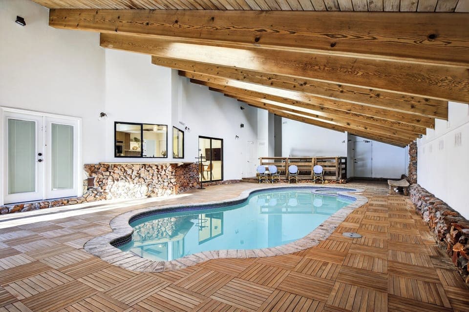 Welcome to Honeypot! Lakefront home with large indoor pool to enjoy a swim any time of the year.