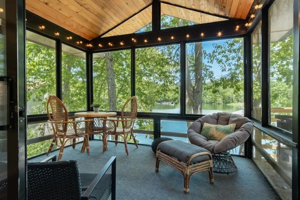 Enjoy your morning coffee or happy-hour in the tree-house-like screened-in-porch