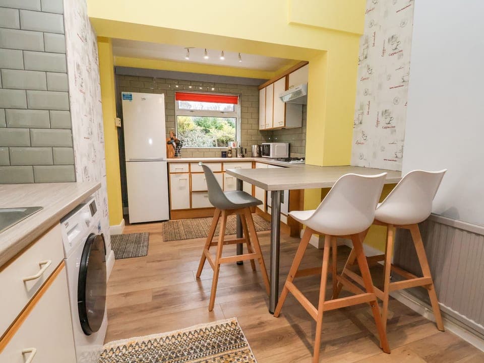 Fridge, electric kettle, toaster, cookware/dishes/utensils