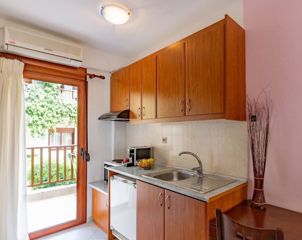 Suite, 2 Bedrooms (for 4) | Private kitchen | Fridge, microwave, stovetop, coffee/tea maker