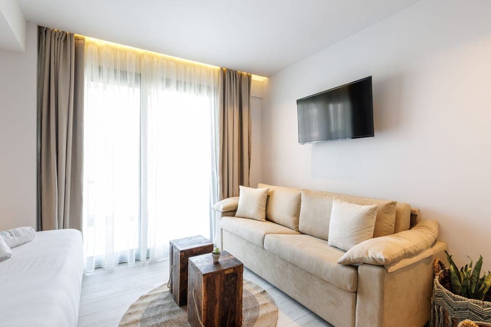 Premium Suite, Ground Floor | Living area | 32-inch LED TV with satellite channels, TV