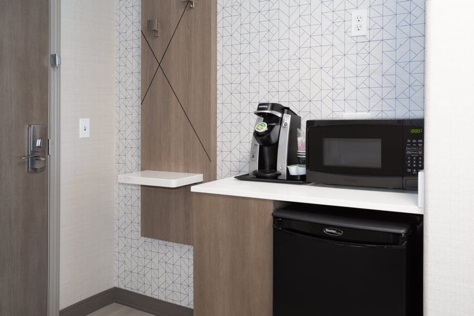 Hypo-allergenic bedding, desk, blackout drapes, iron/ironing board