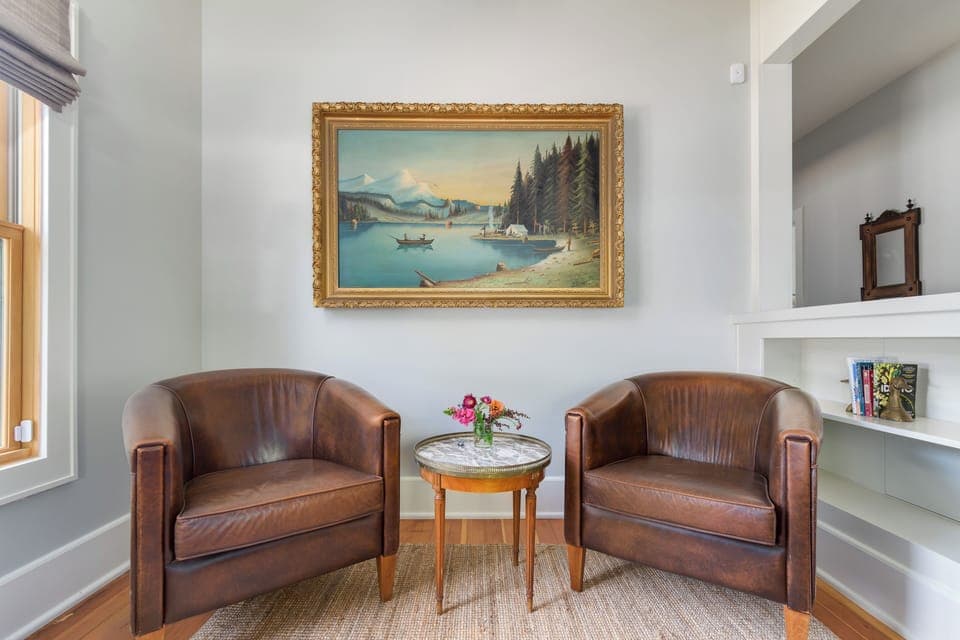 Early 1900s painting of the Oregon countryside in the parlor.