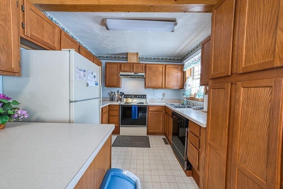 【Kitchen】 Counter prep plus coffee setup — stocked for real cooking.