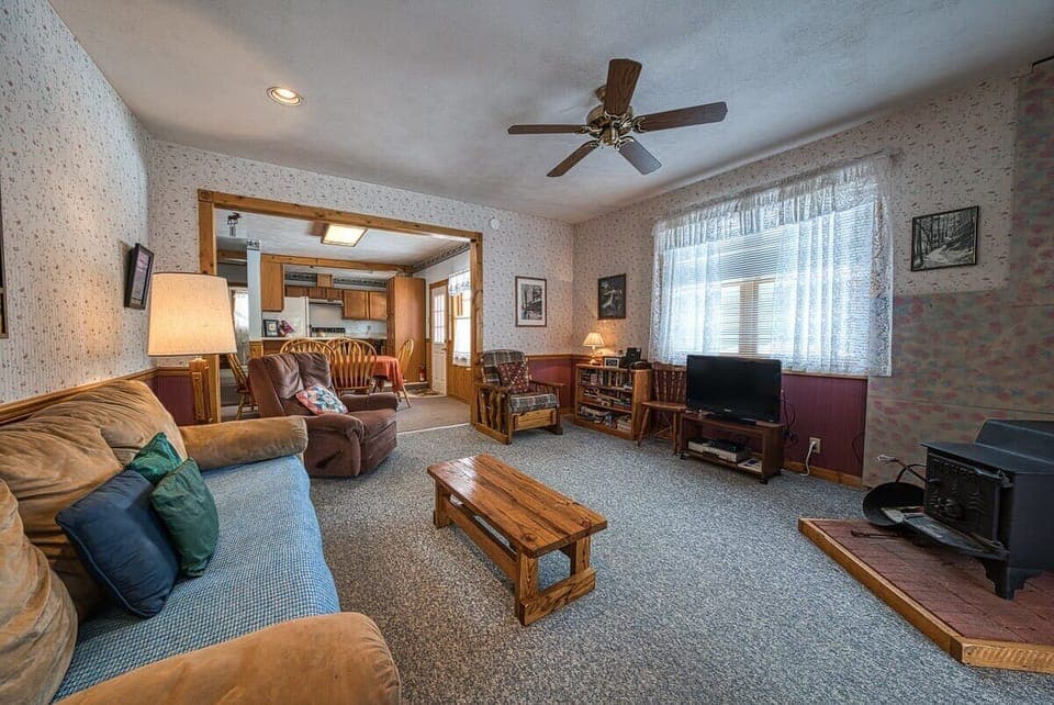 【Living Room】 Sawatch light through the windows; sit by the wood stove.